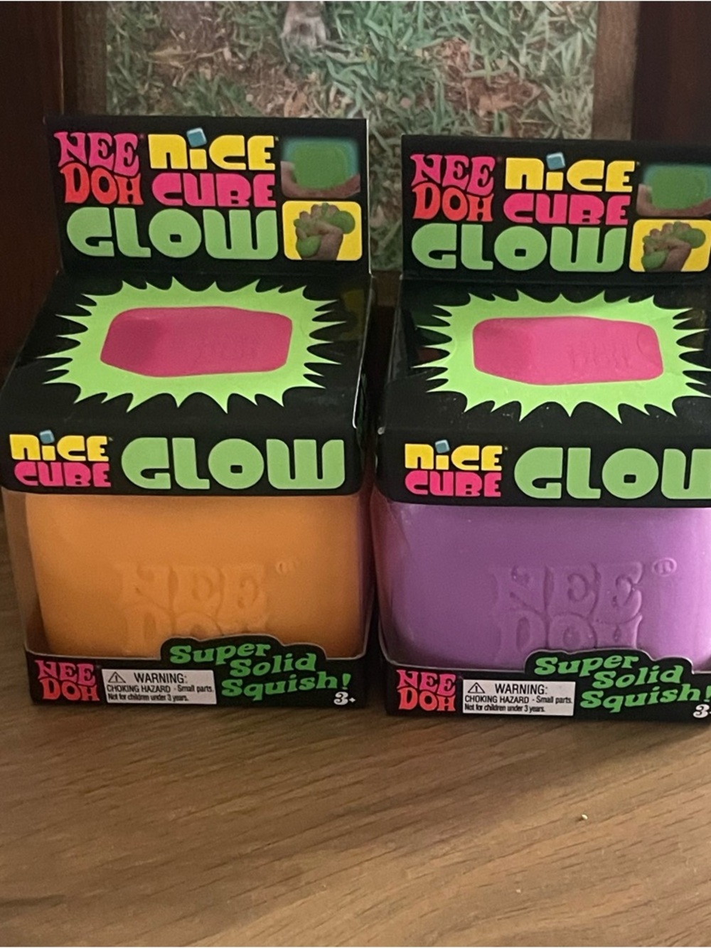 Nee Doh Nice Cube Glow Super Solid Squish - Orange and Purple